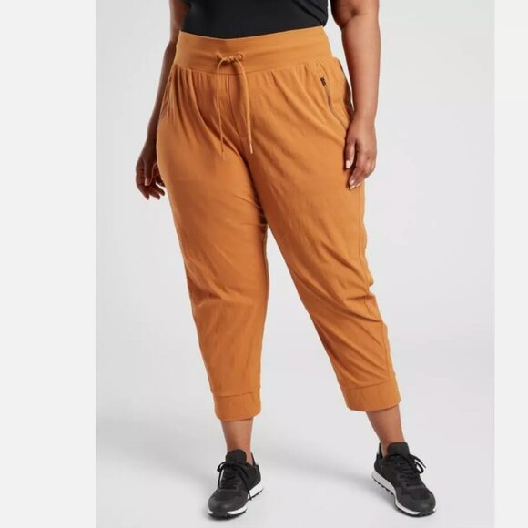 Size 26 - ATHLETA - Trekkie North Jogger Pants Orange Pumpkin Camel NEW - Picture 1 of 5